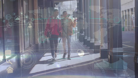 walking on city street, three people viewing animation of digital world map