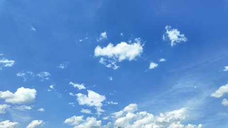 White-Clouds-Disappear-In-The-Hot-Sun-On-Blue-Sky,-Time-Lapse-Video