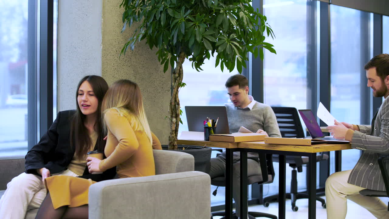 Coworkers talking in the break