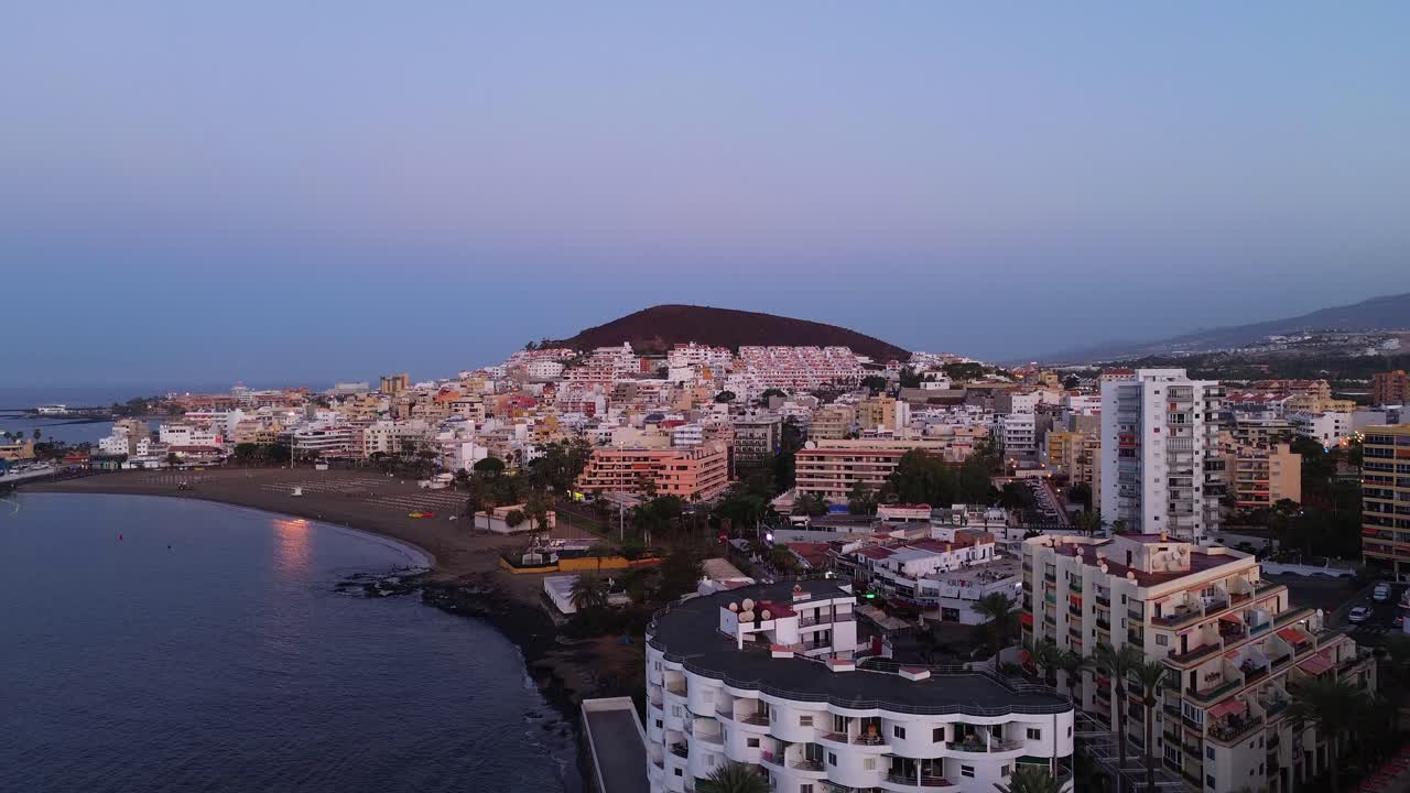 Tenerife Los Cristianos port holiday resort city Canary Islands Spain island aerial drone ocean view