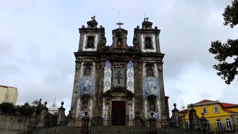 unique church of igreja de santo ildefonso in porto with blue and white tiles of facade