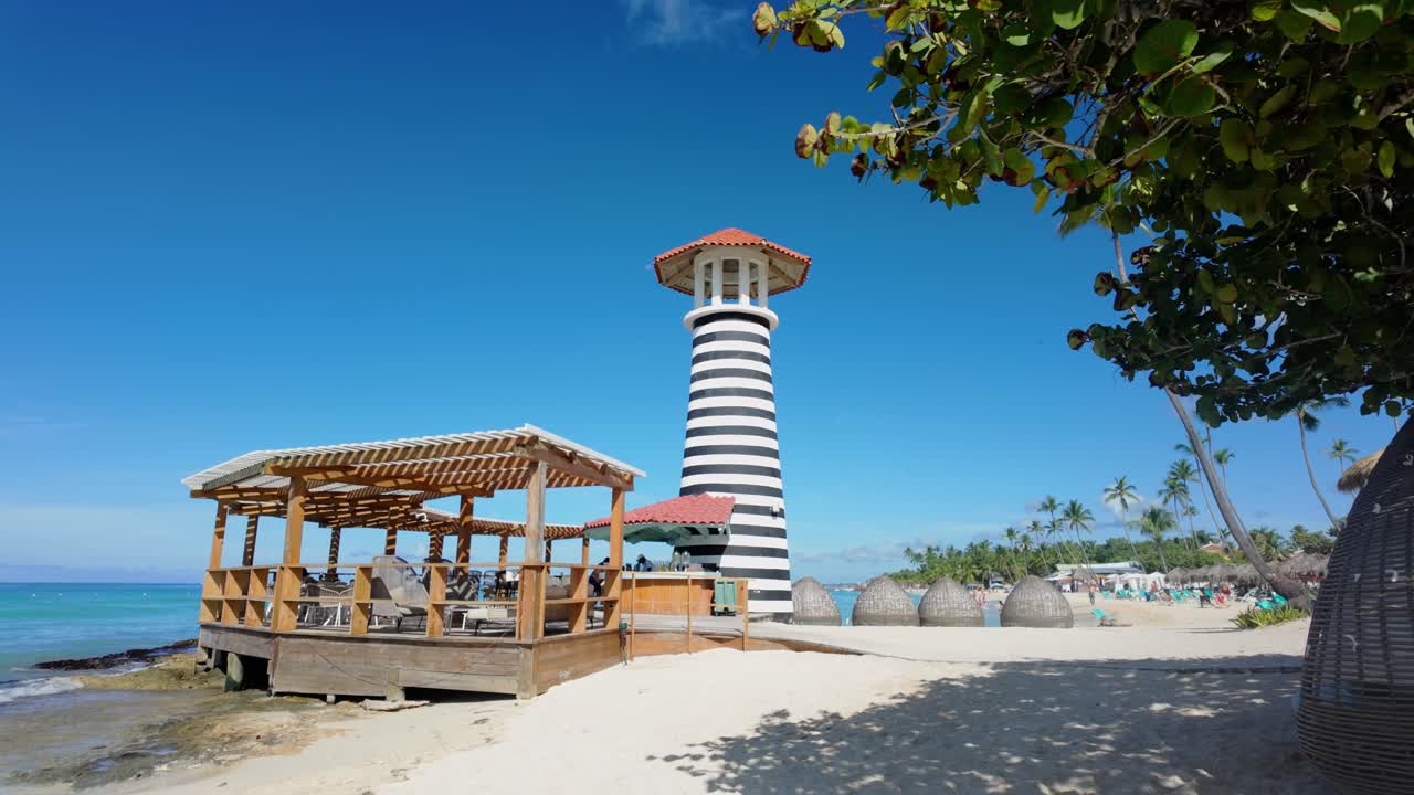 Pan shot of Lighthouse on the Playa Dominicus beach in Bayahibe, Dominican Republic