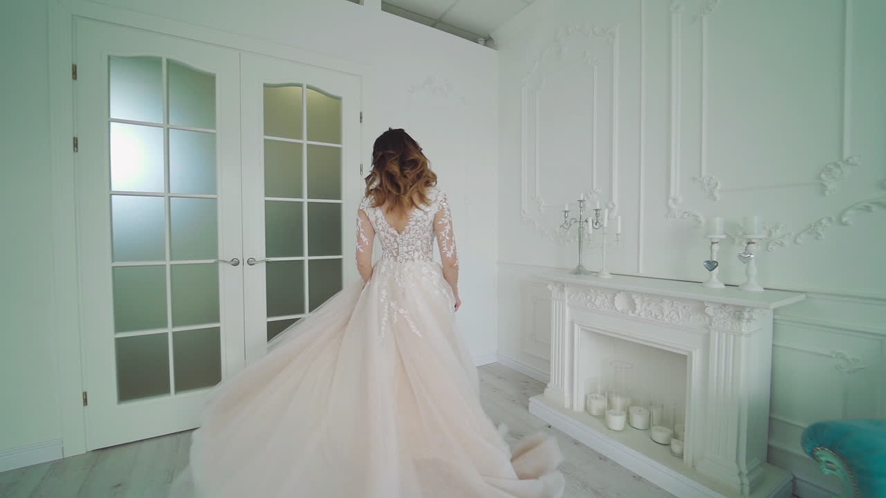 Woman portait with profeshional makeup. Studio interior view of fashion model in wedding dress