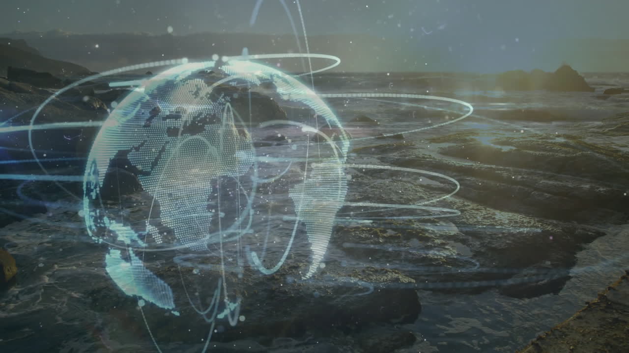 Digital globe with network connections animating over ocean landscape at sunset