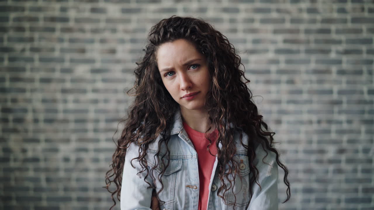 Woman Pointing and Looking Disapproving