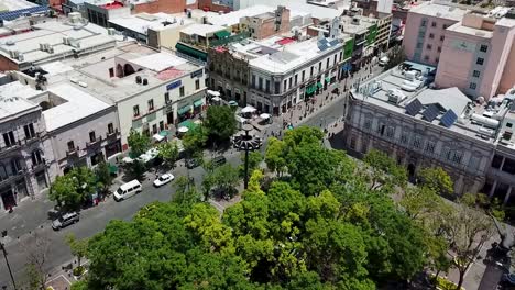 orbital aerial shot of the historic buildings in the central square of aguascalientes city, mexico