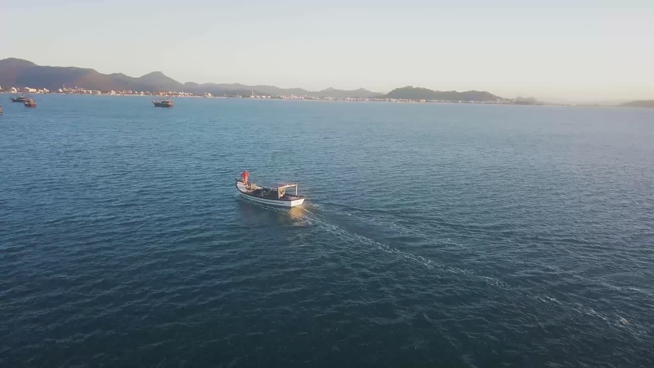 Aerial View Approaching Fishing Boar on Coast of Florianopolis at Evening