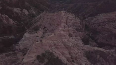 Flying-over-huge-mountains-to-reveal-beautiful-sunset