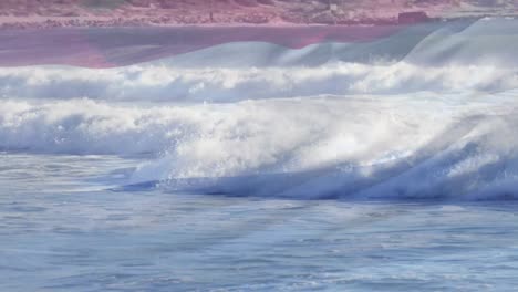 digital composition of waving netherlands flag against waves in the sea