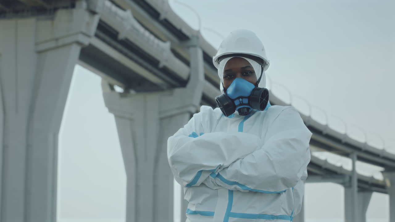 Portrait of Confident Ecologist in Protective Uniform and Respiratory Mask
