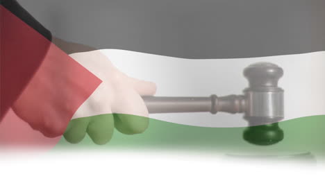 animation of flag of palestine over caucasian male judge using gavel