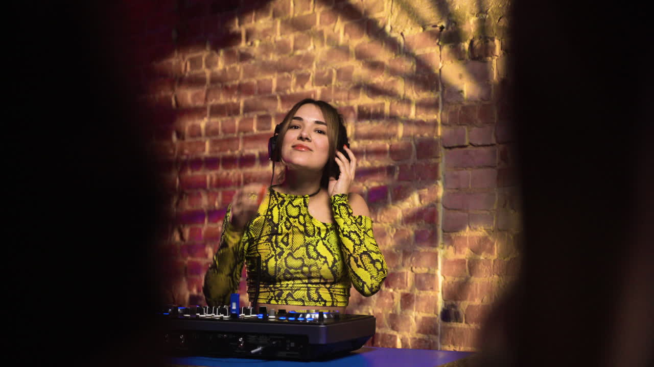 Woman djing at the disco