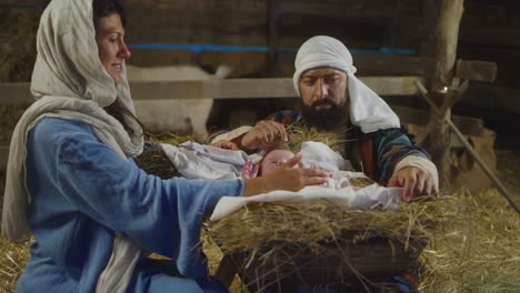 nativity scene with baby jesus, mary, and joseph