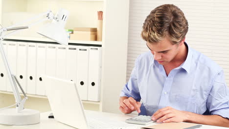 Young-businessman-working-from-home