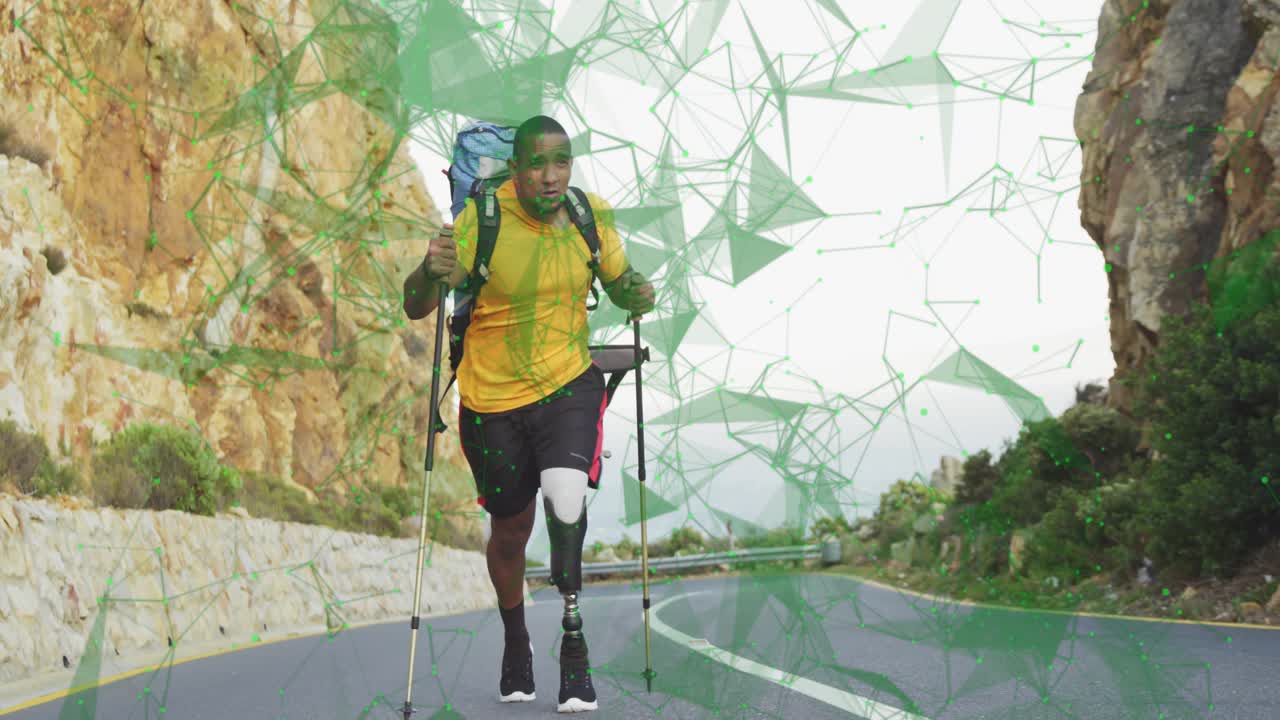 Male hiker entering bend closing camera using poles prosthetic showing green overlay for fitness