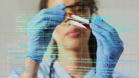 analyzing blood sample, scientist with blue gloves over programming code animation