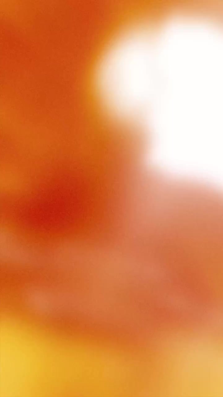 Dynamic Red and Orange Light Leak Background