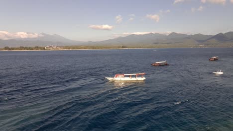 Aerial-circling-shot-of-parking-boats-during-sunset