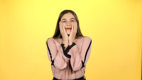 woman expressing surprise and happiness