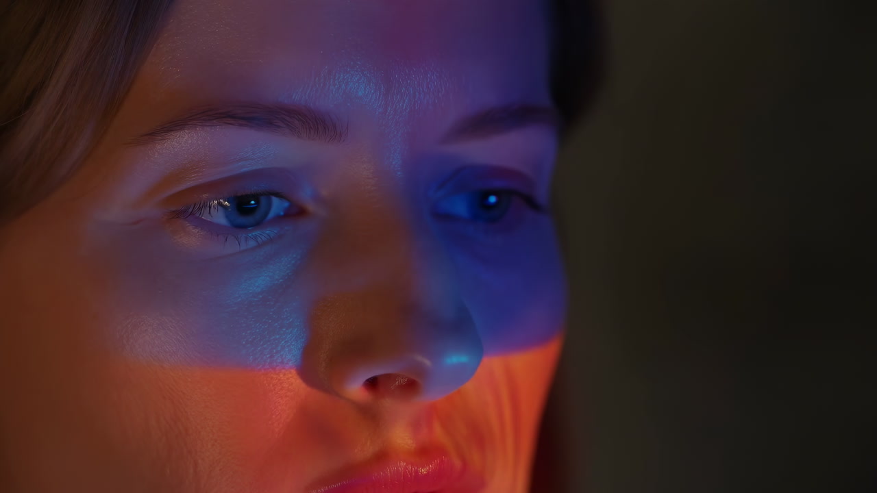 Projected Red Mask Across Woman Face With Warm Yellow Highlights, Artist Testing Projection Mapping,