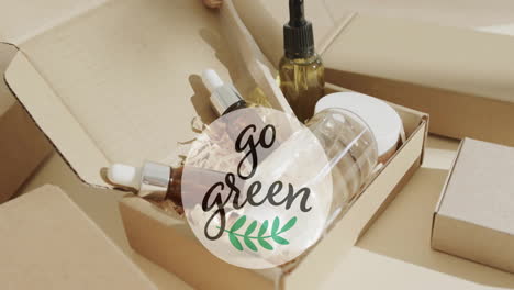 animation of go green text and leaf logo over organic beauty products in plain packaging