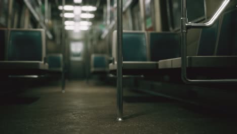 inside of the old non-modernized subway car in usa