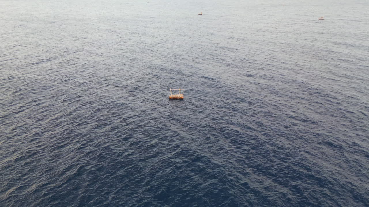 Bamboo Raft Floats In The Bali Sea Near Amed Beach Indonesia