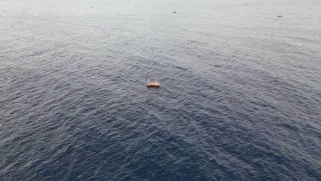 Bamboo-Raft-Floats-In-The-Bali-Sea-Near-Amed-Beach-Indonesia