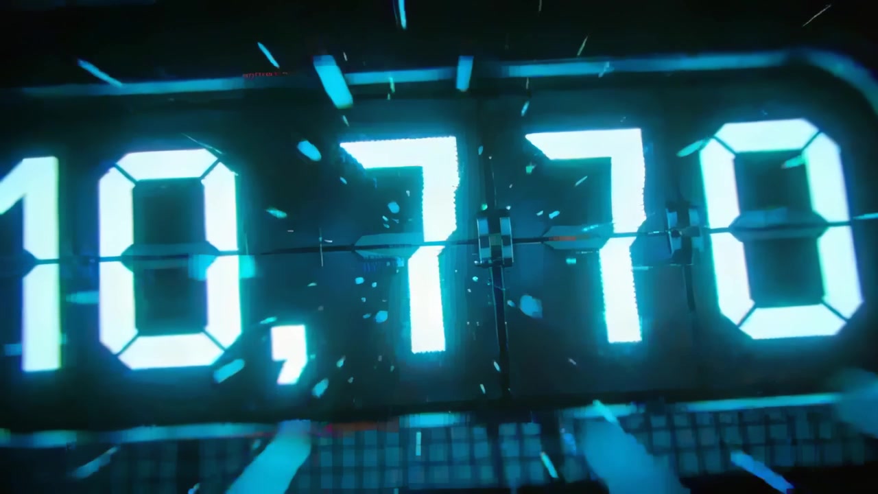 Animating cyan 7-segment display updating digits on frame-change with grid, emitting particles