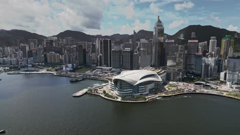 aerial of the hong kong convention and exhibition centre and city skyline, wan chai, hong kong, china