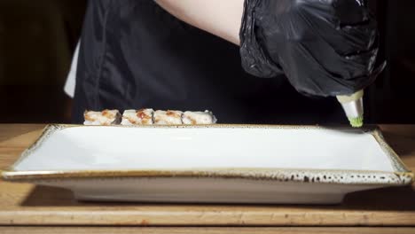 chef preparing sushi