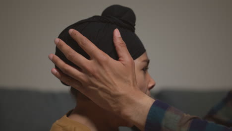 Close-Up-Of-Father-Using-Salai-Needle-To-Tidy-Away-Hair-When-Tying-Turban-Onto-Head-Of-Young-Sikh-Son-Shot-in-Real-Time-1