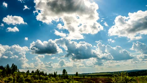 blue sky white clouds background timelapse. beautiful weather at cloudy heaven. beauty of bright color, light in summer nature. abstract fluffy, puffy cloudscape in air time lapse. video loop