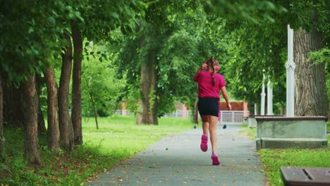 a young girl enjoying her leisure time while listening to music in a serene park setting, engaged in exploration and playfulness amongst nature's beauty