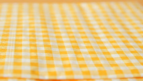 close up of yellow checkered fabric