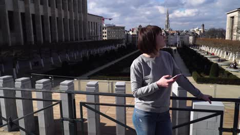 tourist lady looks at attractions in the city of brussels belgium