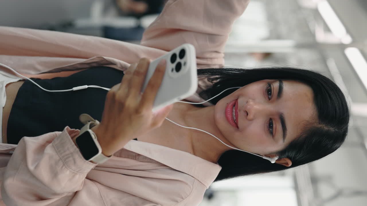 Woman listening to music on train