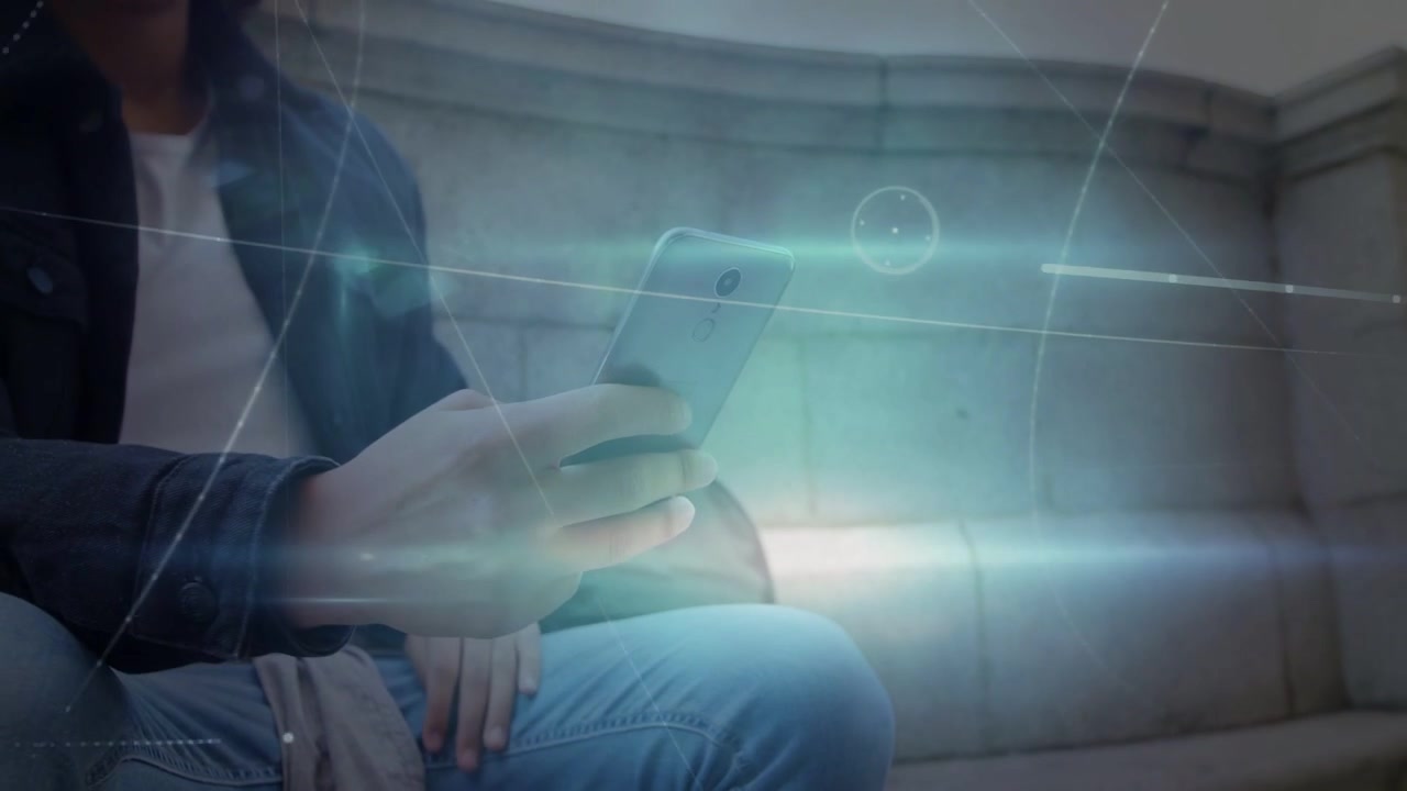 Man tapping and swiping phone on bench, starting HUD graphics while camera pulling back for tech