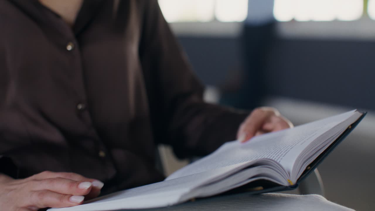Woman Reading in Office Setting