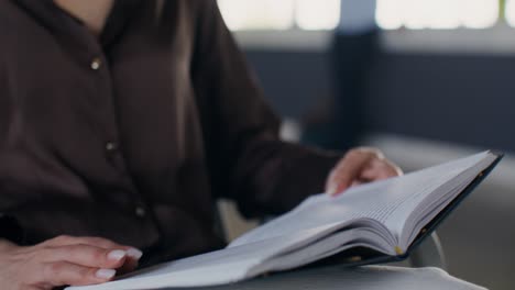woman reading in office setting