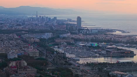 barcelona harbor at sunrise, aerial establishing city shot