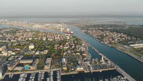 aerial view of a infrastructure of a seaport, with various industries.