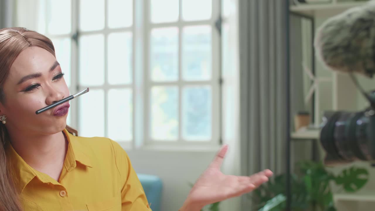 Funny Influencer Young Transgender Woman Blogger Laugh And Smile, Makeup Tutorial Video At Home Studio