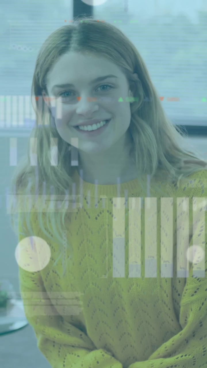 Animation of financial data processing over caucasian businesswoman in office