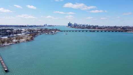 detroit river with bridge to belle isle, aerial drone view