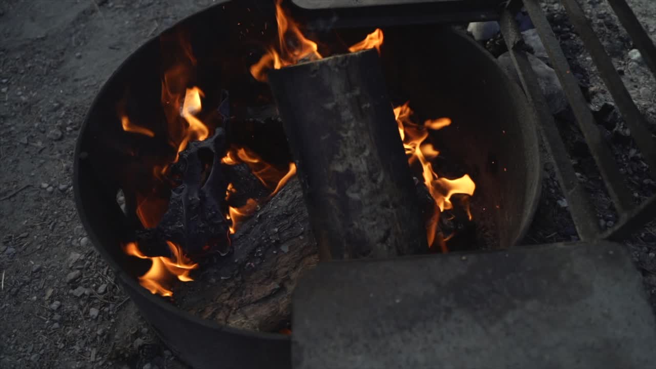 Woods Burning In A Metal Bin At Banff National Park In Alberta, Canada - Slowmo