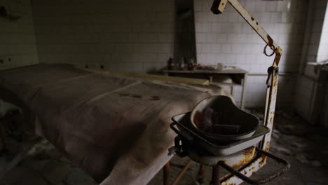 selective focus pull out of the remains of an operating room in a russian hospital nearly forty years after the nuclear disaster when the chernobyl nuclear power station reactor melted down