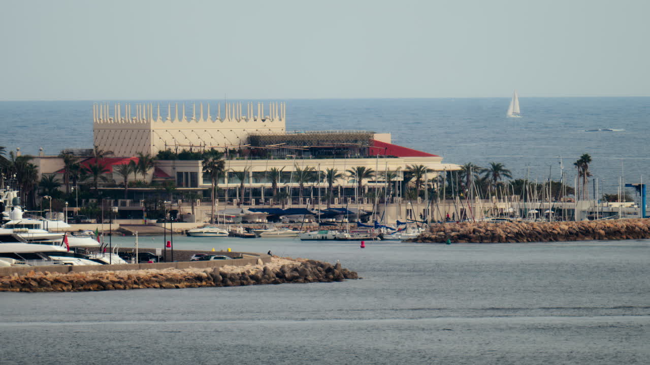 Cannes, France - March 13, 2025: Distant view of boats docked in the Cannes Marina