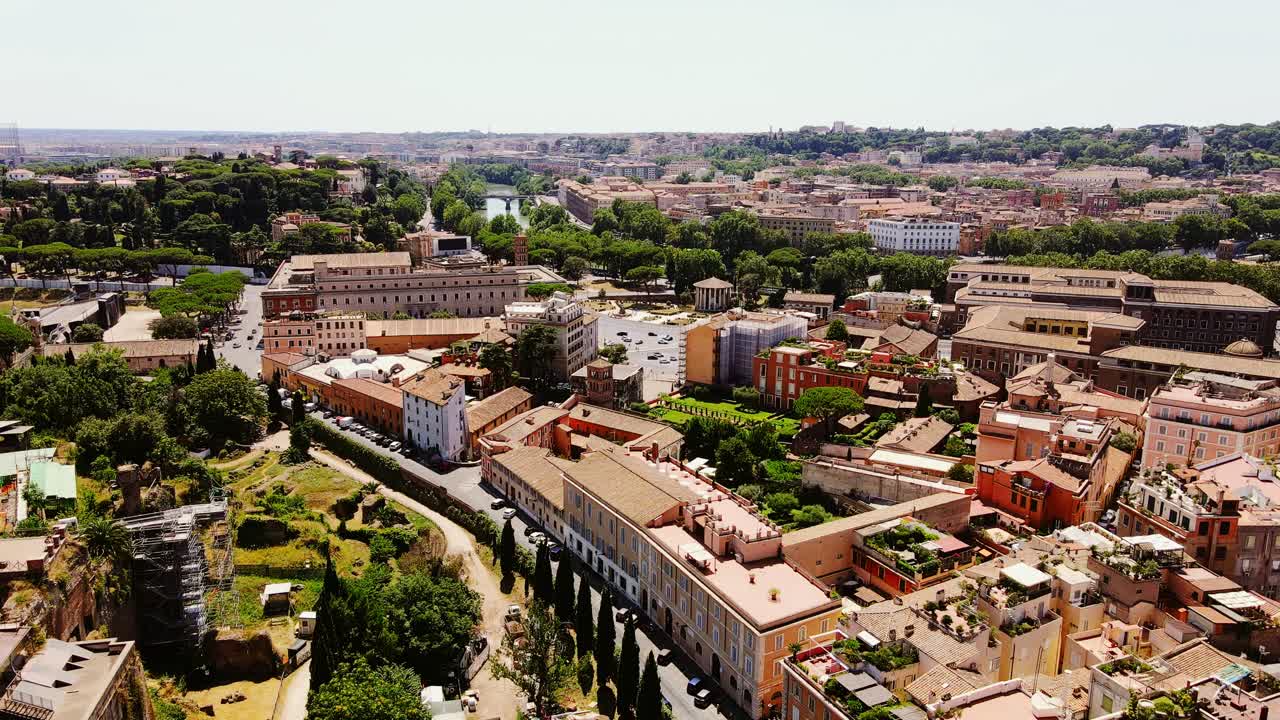 Dense cityscape of Rome highlights pollution, traffic, fading historical gems