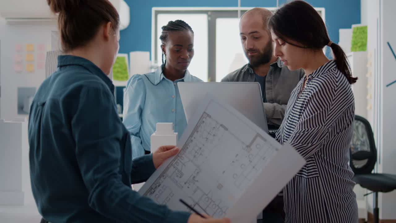 Architectural Team Meeting in Modern Office